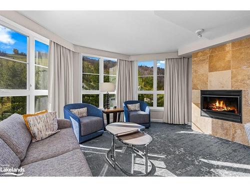 315-220 Gord Canning Drive Drive, The Blue Mountains, ON - Indoor Photo Showing Living Room With Fireplace