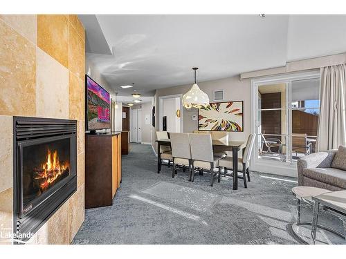 315-220 Gord Canning Drive Drive, The Blue Mountains, ON - Indoor Photo Showing Living Room With Fireplace