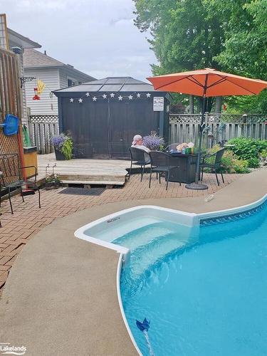 97 Glen Eton Road, Wasaga Beach, ON - Outdoor With In Ground Pool With Deck Patio Veranda With Backyard