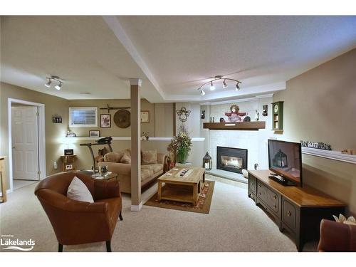 97 Glen Eton Road, Wasaga Beach, ON - Indoor Photo Showing Living Room With Fireplace