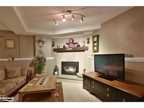 97 Glen Eton Road, Wasaga Beach, ON - Indoor Photo Showing Living Room With Fireplace