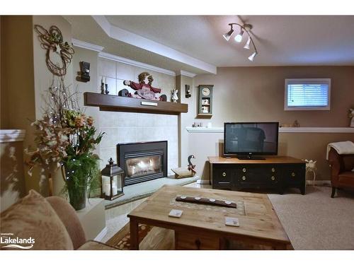 97 Glen Eton Road, Wasaga Beach, ON - Indoor Photo Showing Living Room With Fireplace