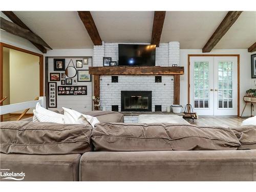 449 Mertz Corner Rd, Tiny, ON - Indoor Photo Showing Living Room With Fireplace