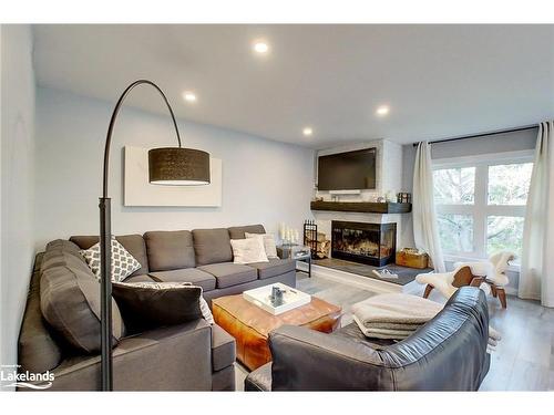 410 Mariners Way, Collingwood, ON - Indoor Photo Showing Living Room With Fireplace