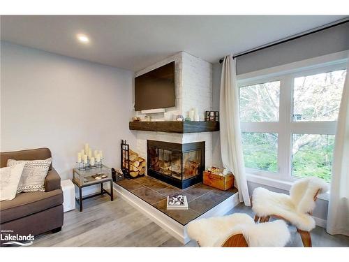 410 Mariners Way, Collingwood, ON - Indoor Photo Showing Living Room With Fireplace