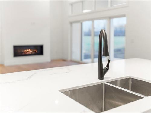 1778 Warminster Sideroad, Oro-Medonte, ON - Indoor Photo Showing Kitchen With Fireplace