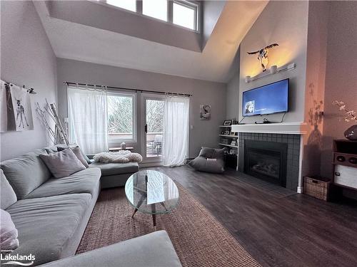 206-107 Wintergreen Place, The Blue Mountains, ON - Indoor Photo Showing Living Room With Fireplace