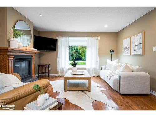 84 Wasaga Sands Drive, Wasaga Beach, ON - Indoor Photo Showing Living Room With Fireplace