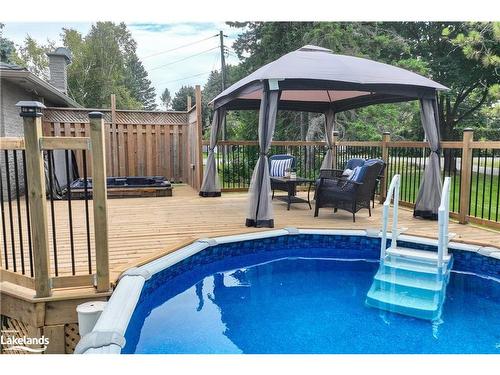 4693 Daniel Street, Ramara, ON - Outdoor With Above Ground Pool With Deck Patio Veranda With Backyard