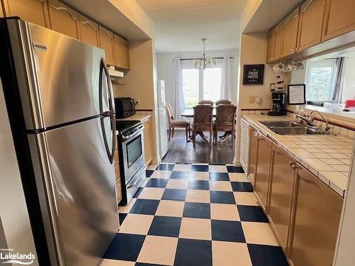 106-169 Jozo Weider Boulevard, The Blue Mountains, ON - Indoor Photo Showing Kitchen With Double Sink