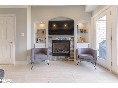 15-209707 Highway 26 Highway, The Blue Mountains, ON - Indoor Photo Showing Living Room With Fireplace