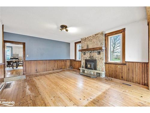 556341 6Th Line, The Blue Mountains, ON - Indoor Photo Showing Living Room With Fireplace