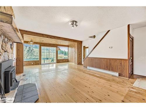 556341 6Th Line, The Blue Mountains, ON - Indoor Photo Showing Other Room With Fireplace