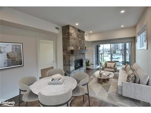 207-11 Beckwith Lane, The Blue Mountains, ON - Indoor Photo Showing Living Room With Fireplace