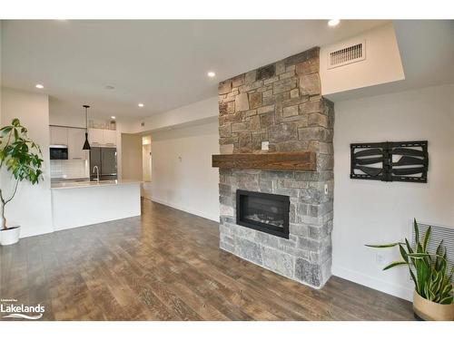 207-11 Beckwith Lane, The Blue Mountains, ON - Indoor Photo Showing Living Room With Fireplace