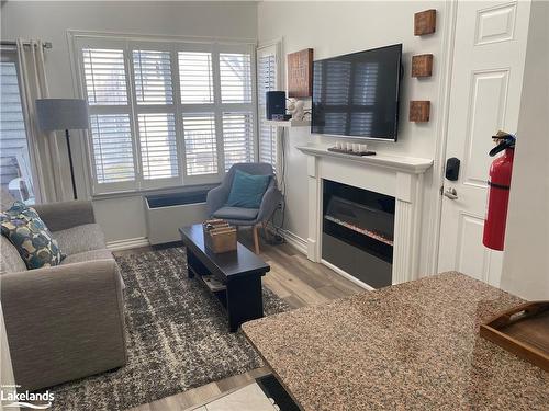 516-796468 Grey Road 19, The Blue Mountains, ON - Indoor Photo Showing Living Room With Fireplace