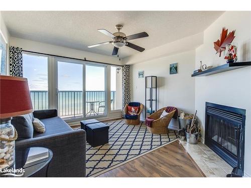 8-1064 Tiny Beaches Road S, Tiny, ON - Indoor Photo Showing Living Room With Fireplace