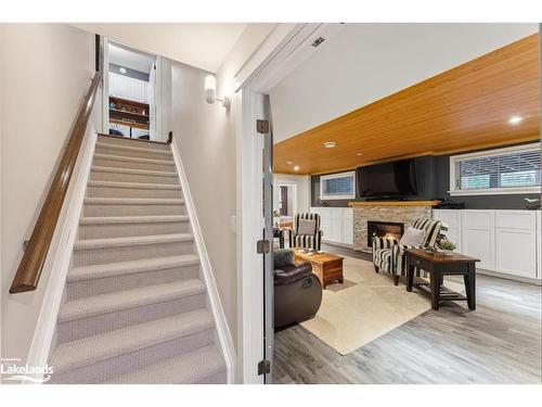 33 South Harbour Drive, Bobcaygeon, ON - Indoor Photo Showing Other Room With Fireplace