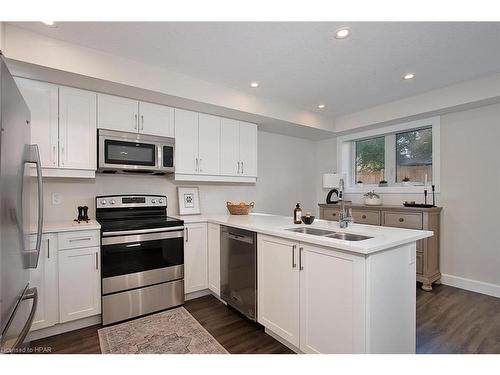 6-3202 Vivian Line, Stratford, ON - Indoor Photo Showing Kitchen With Double Sink