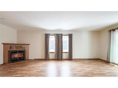 50 Cherokee Lane, Meneset, ON - Indoor Photo Showing Other Room With Fireplace