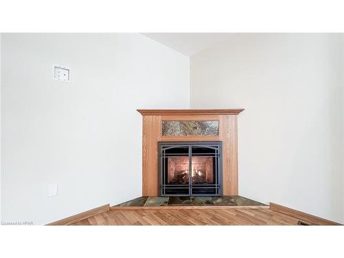 50 Cherokee Lane, Meneset, ON - Indoor Photo Showing Living Room With Fireplace