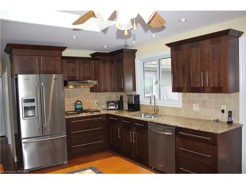 24575 Saxton Road, Strathroy Caradoc (Munic), ON - Indoor Photo Showing Kitchen With Double Sink