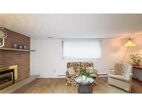133 Bennett Street W, Goderich, ON - Indoor Photo Showing Living Room With Fireplace