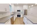 8-34 Upper Thames Lane Lane, Mitchell, ON  - Indoor Photo Showing Kitchen With Double Sink 