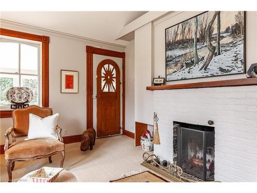 14 & 16 Chiniquy Street, Bayfield, ON - Indoor Photo Showing Living Room With Fireplace