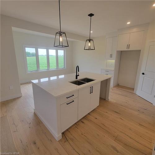 112 Rowe Avenue, Exeter, ON - Indoor Photo Showing Kitchen With Double Sink