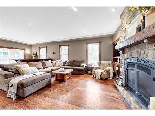 5765 3Rd Line, Minto, ON - Indoor Photo Showing Living Room With Fireplace