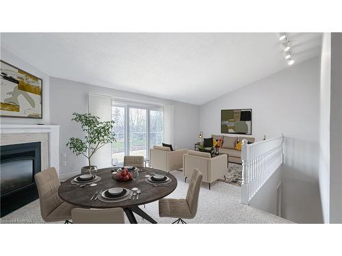 15-90 Ontario Street S, Grand Bend, ON - Indoor Photo Showing Dining Room With Fireplace