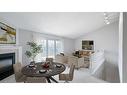 15-90 Ontario Street S, Grand Bend, ON  - Indoor Photo Showing Dining Room With Fireplace 