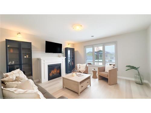 188 Lake Breeze Drive, Ashfield-Colborne-Wawanosh, ON - Indoor Photo Showing Living Room With Fireplace