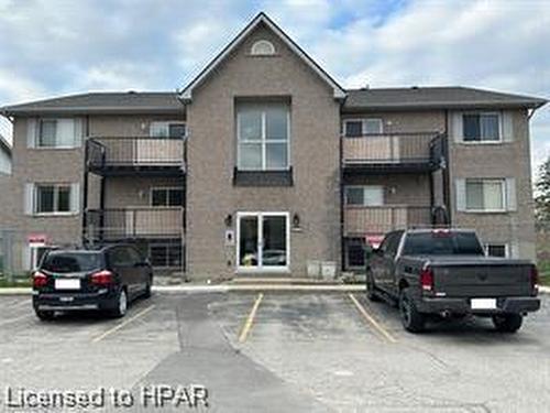 303-50 Campbell Court, Stratford, ON - Outdoor With Facade