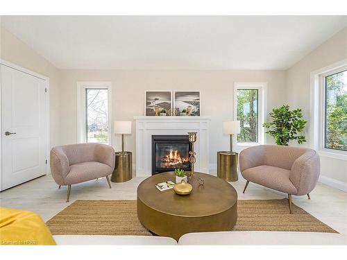 21 Blfs Vw Boulevard, Huron Haven, ON - Indoor Photo Showing Living Room With Fireplace
