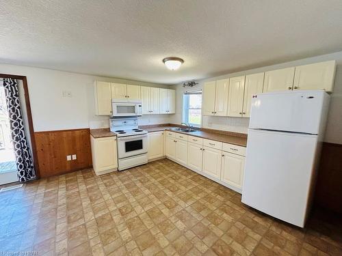 58 Mary Street, Morris-Turnberry, ON - Indoor Photo Showing Kitchen With Double Sink