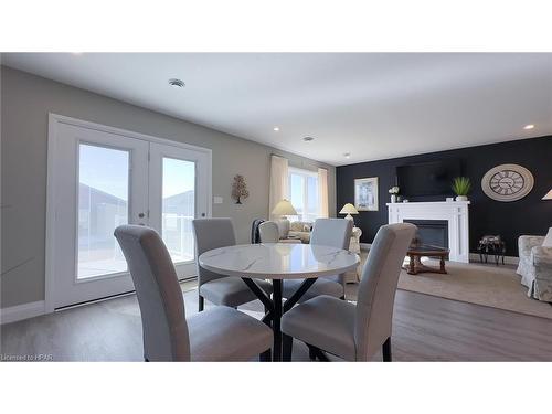 145 Lake Breeze Drive, Ashfield-Colborne-Wawanosh (Twp), ON - Indoor Photo Showing Dining Room With Fireplace