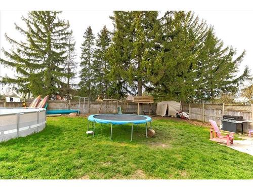 213 Norfolk Street, Stratford, ON - Outdoor With Above Ground Pool With Backyard