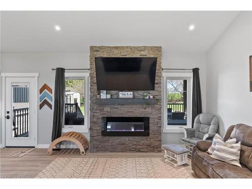 51 Highland Road, Minto, ON - Indoor Photo Showing Living Room With Fireplace