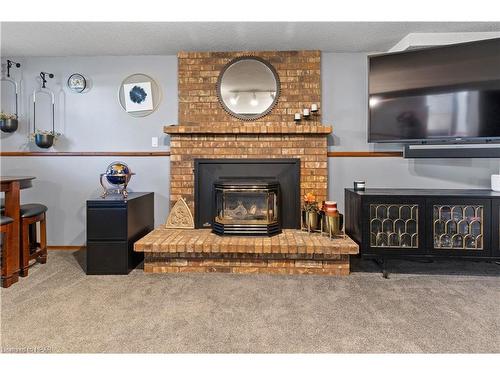 338 Greenwood Drive, Stratford, ON - Indoor Photo Showing Living Room With Fireplace