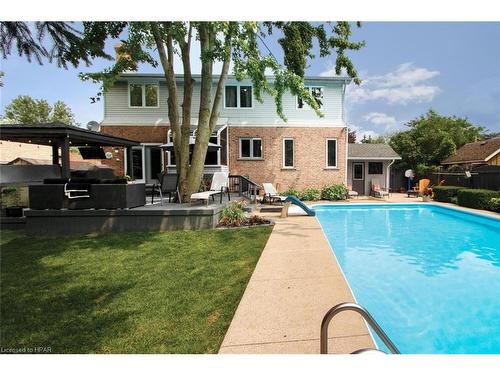 63 Crawford Street, Stratford, ON - Outdoor With In Ground Pool With Deck Patio Veranda With Backyard