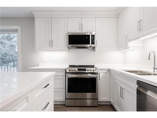 204-100 Gordon Street, Stratford, ON - Indoor Photo Showing Kitchen With Double Sink