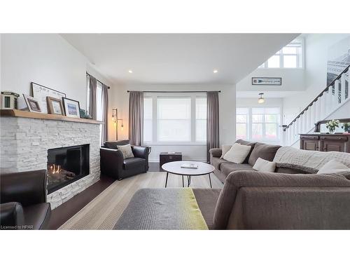 24 Thimbleweed Drive, Bayfield, ON - Indoor Photo Showing Living Room With Fireplace