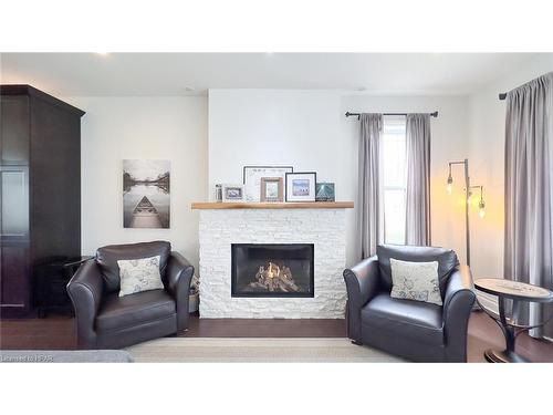 24 Thimbleweed Drive, Bayfield, ON - Indoor Photo Showing Living Room With Fireplace