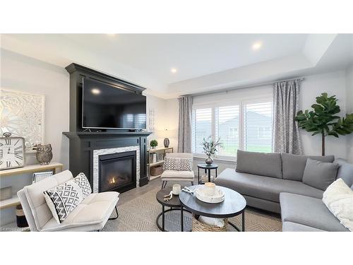 14 Blue Boulevard, Ashfield-Colborne-Wawanosh, ON - Indoor Photo Showing Living Room With Fireplace