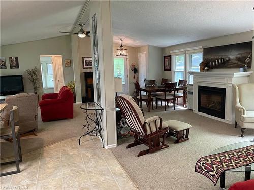 17 Sioux Lane, Meneset, ON - Indoor Photo Showing Living Room With Fireplace