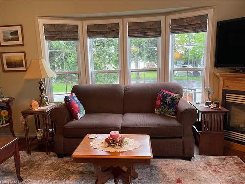54 Cherokee Lane, Meneset, ON - Indoor Photo Showing Living Room With Fireplace