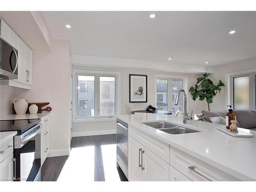 24-3202 Vivian Line, Stratford, ON - Indoor Photo Showing Kitchen With Double Sink