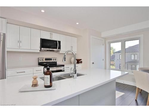 24-3202 Vivian Line, Stratford, ON - Indoor Photo Showing Kitchen With Double Sink With Upgraded Kitchen